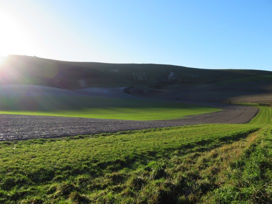 Stopping to pass the time of day with the Long Man as is tradition.